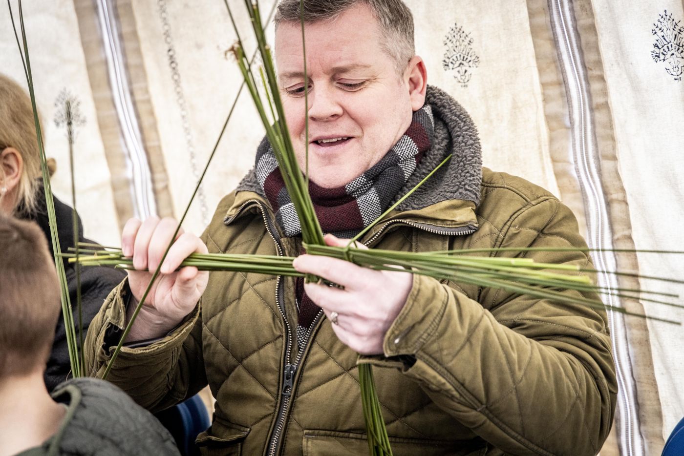 Weaving rushes at a St Brigid's cross workshop