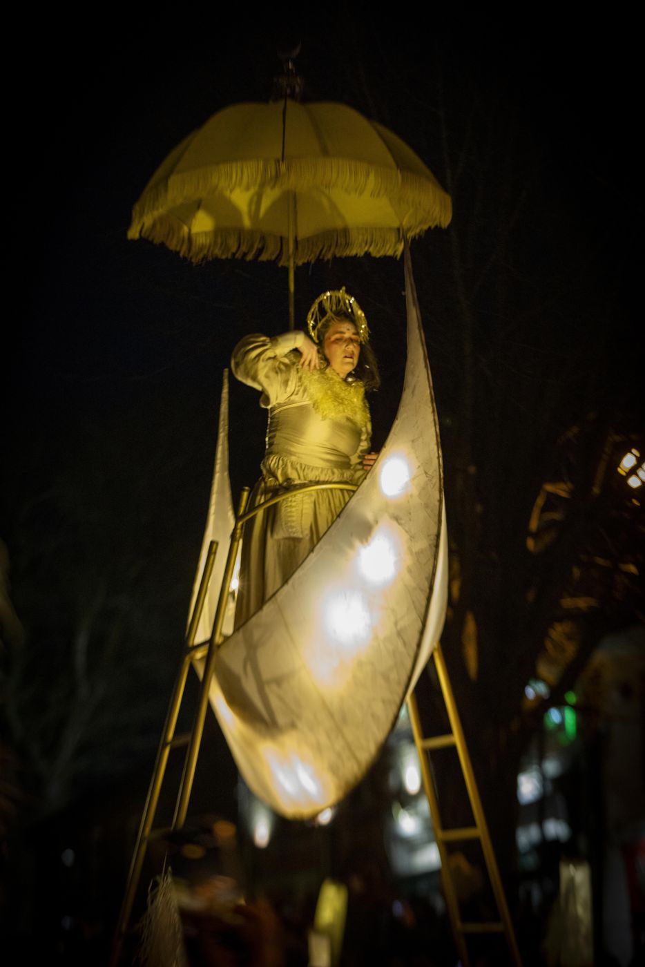 A lantern-lit Brigid figure at the festival